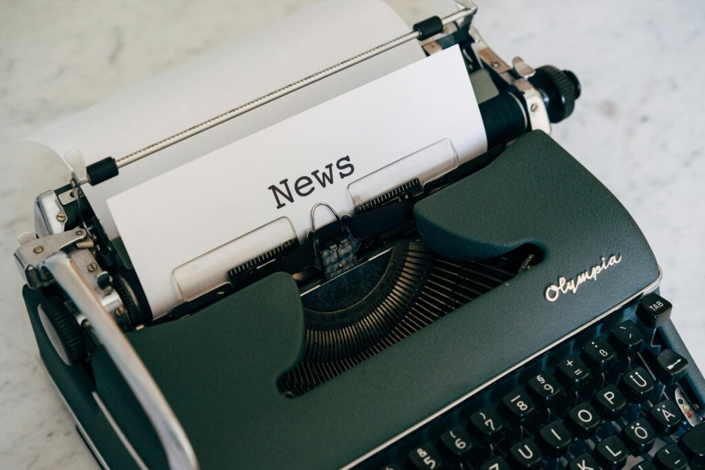 Close-up of an antique typewriter with 'News' on paper. News: SageVault Launches to Support Families with Real-Life Resources for Planning and Loss